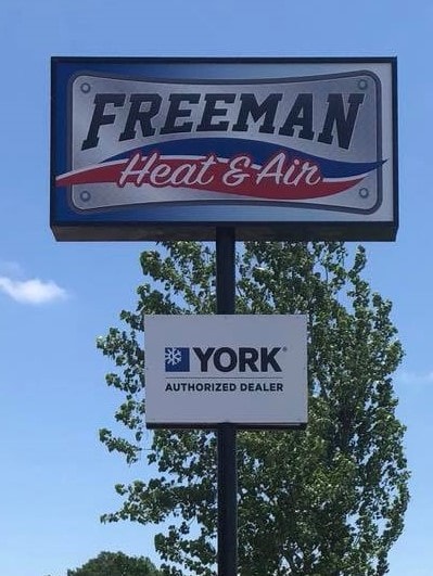 Freeman Heat & Air business sign.