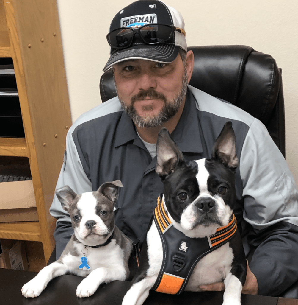 Owner of Freemans with his dogs.